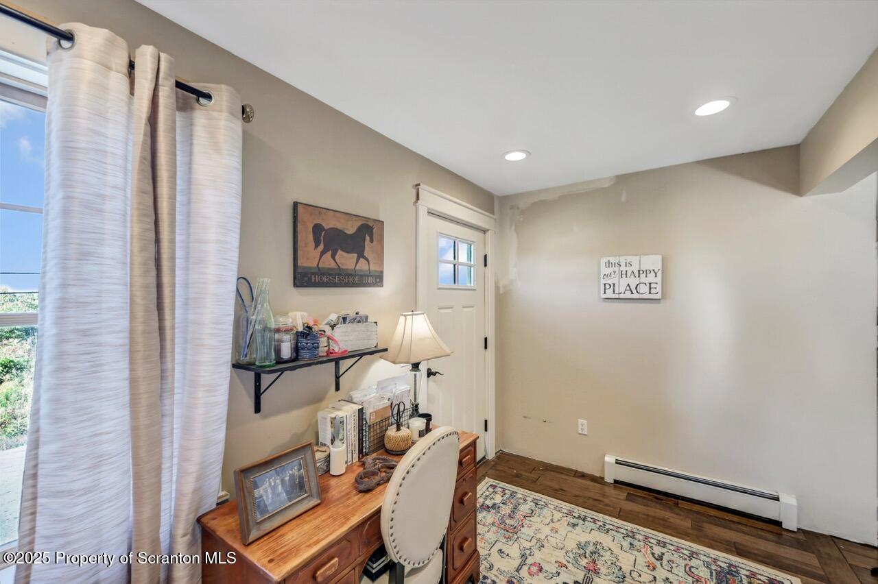 2225 Cherry Hill Road Clarks Summit, PA 18411 - Photo 32 of 81 a living room with furniture and a window