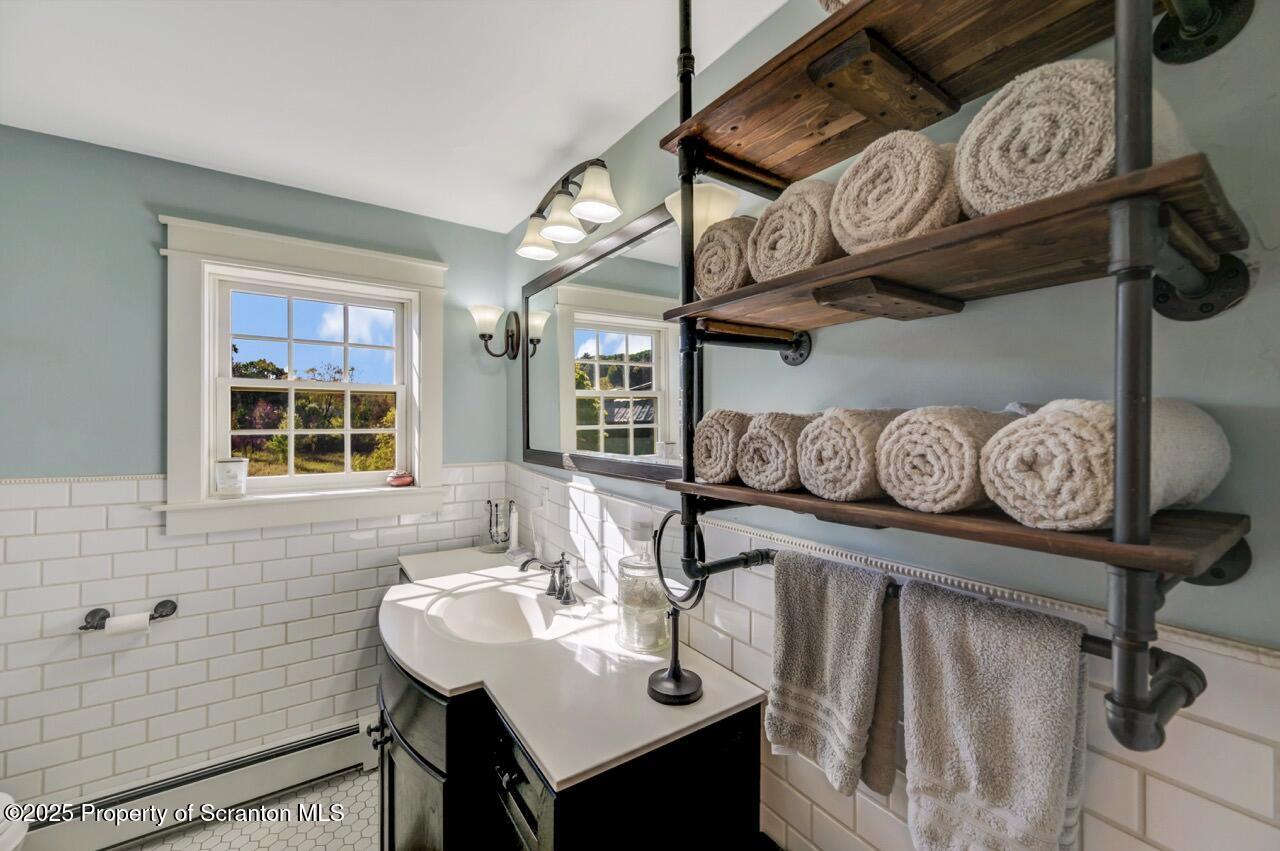 2225 Cherry Hill Road Clarks Summit, PA 18411 - Photo 39 of 81 a view of a kitchen with a table and chairs