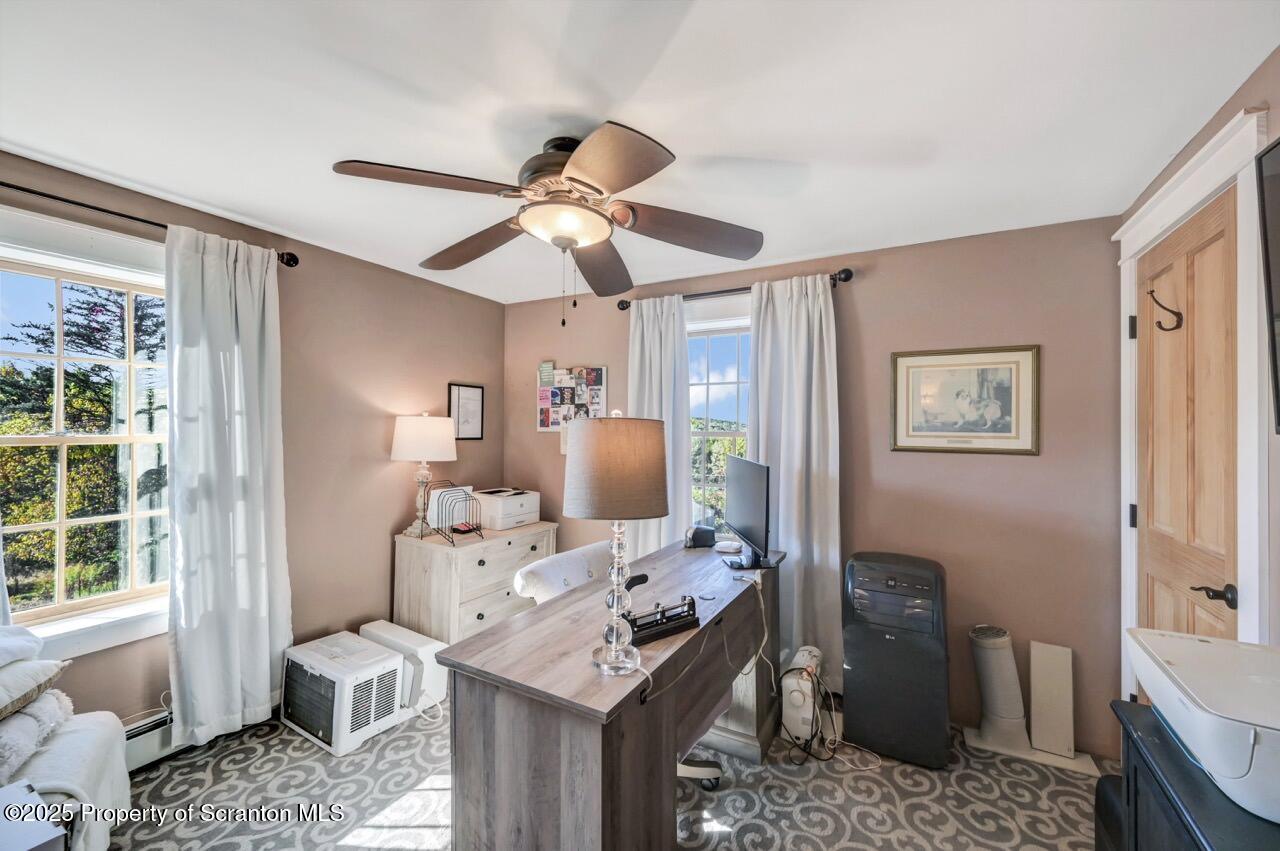 2225 Cherry Hill Road Clarks Summit, PA 18411 - Photo 42 of 81 a view of a workspace with furniture and a window