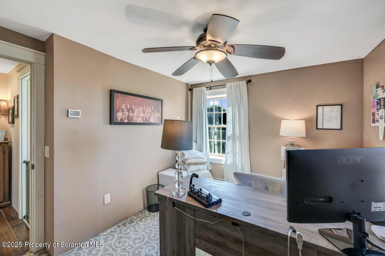 2225 Cherry Hill Road Clarks Summit, PA 18411 - Photo 44 of 81 a view of a workspace with furniture and a window