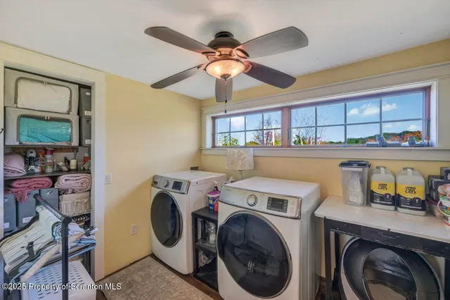 a view of a garden with an outdoor seating