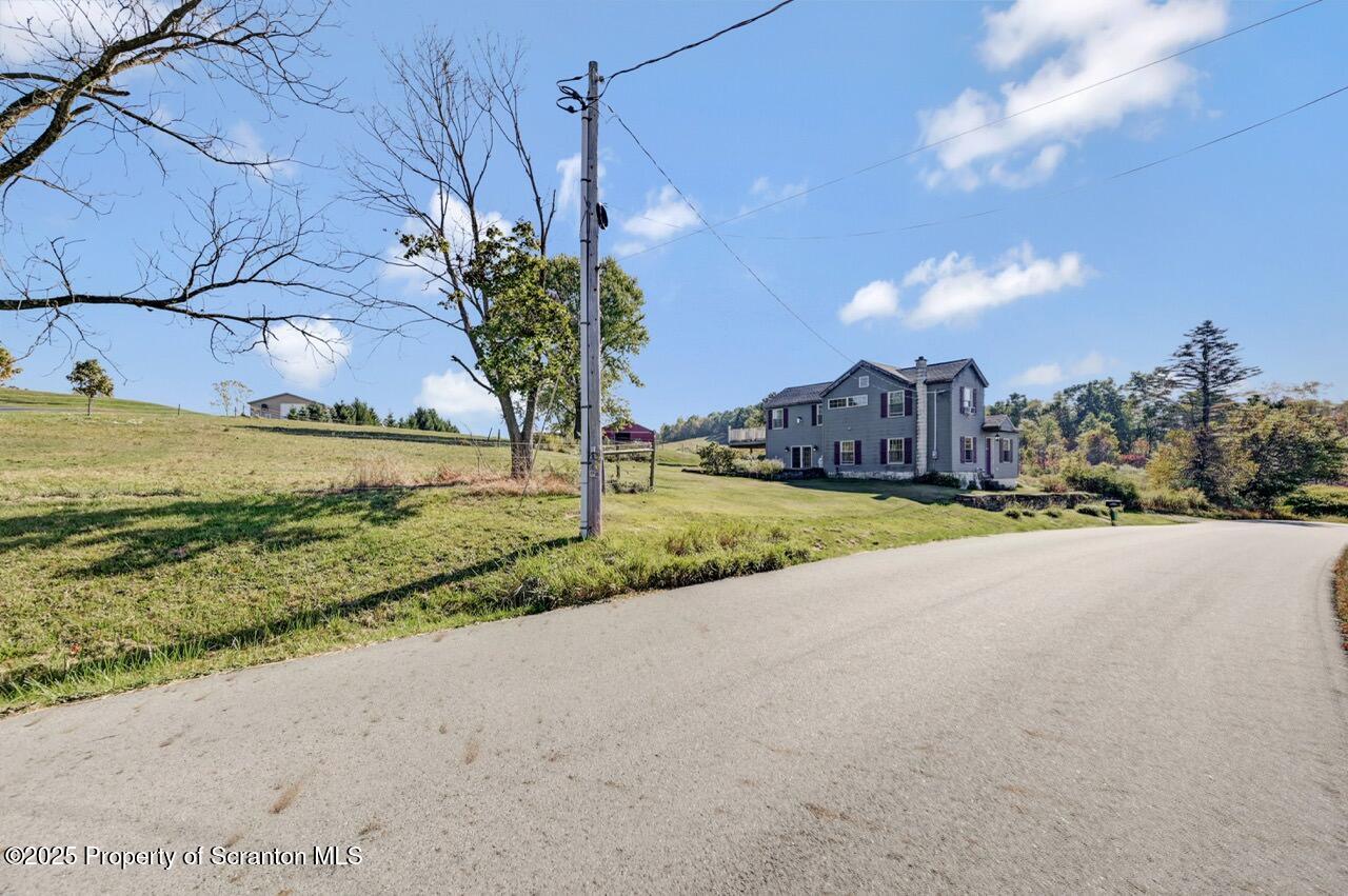 2225 Cherry Hill Road Clarks Summit, PA 18411 - Photo 81 of 81 a view of a street with houses on both side of it