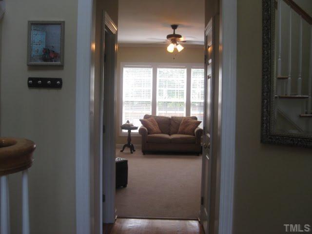 6405 Nowell Pointe Drive Raleigh, NC 27607 - Photo 2 of 19 LOOKING INTO THE FAMILY ROOM FROM THE FOYER. PLENTY OF LIGHT THROUGH THOSE WINDOWS LOOKING INTO THE FENCED IN YARD.