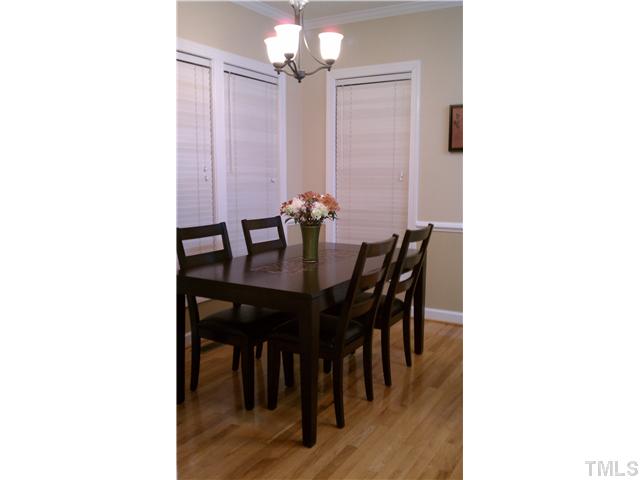 6405 Nowell Pointe Drive Raleigh, NC 27607 - Photo 8 of 19 Dining area of the home with lots of natural light.
