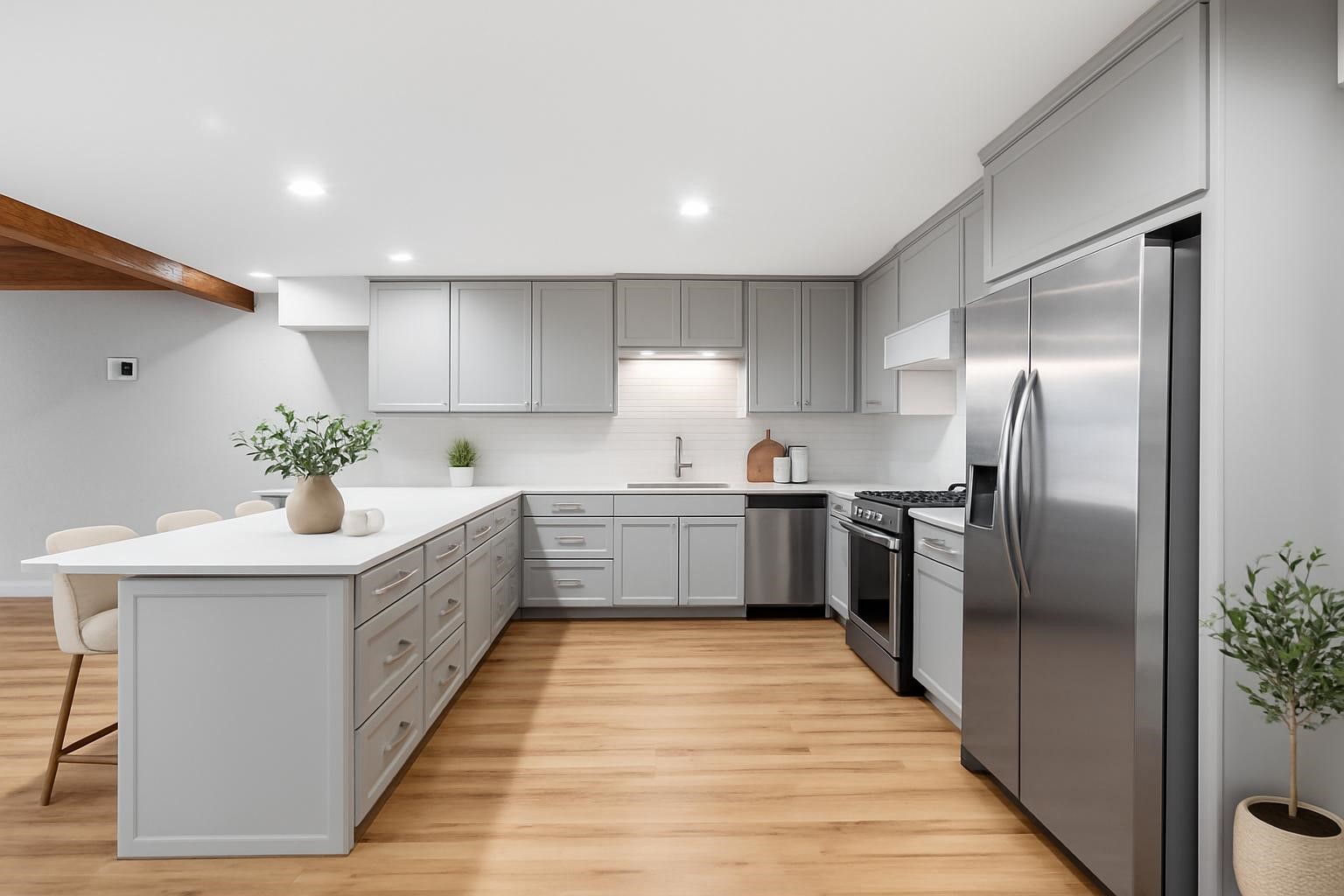 3141 Bissonnet Street Houston, TX 77005 - Photo 22 of 45 a kitchen with stainless steel appliances a sink and a refrigerator