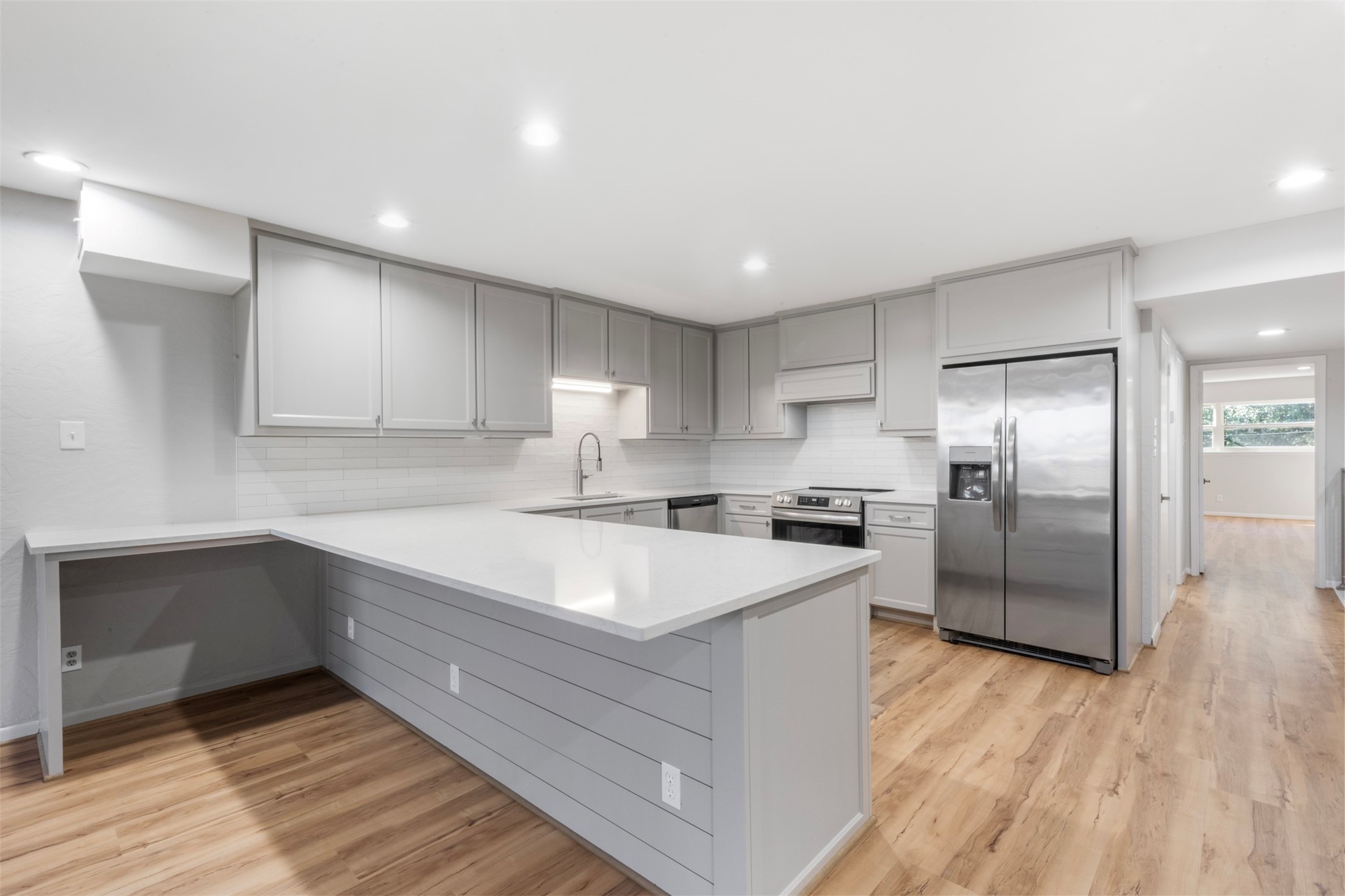 3141 Bissonnet Street Houston, TX 77005 - Photo 24 of 45 a kitchen with stainless steel appliances granite countertop a sink a stove a refrigerator and cabinets