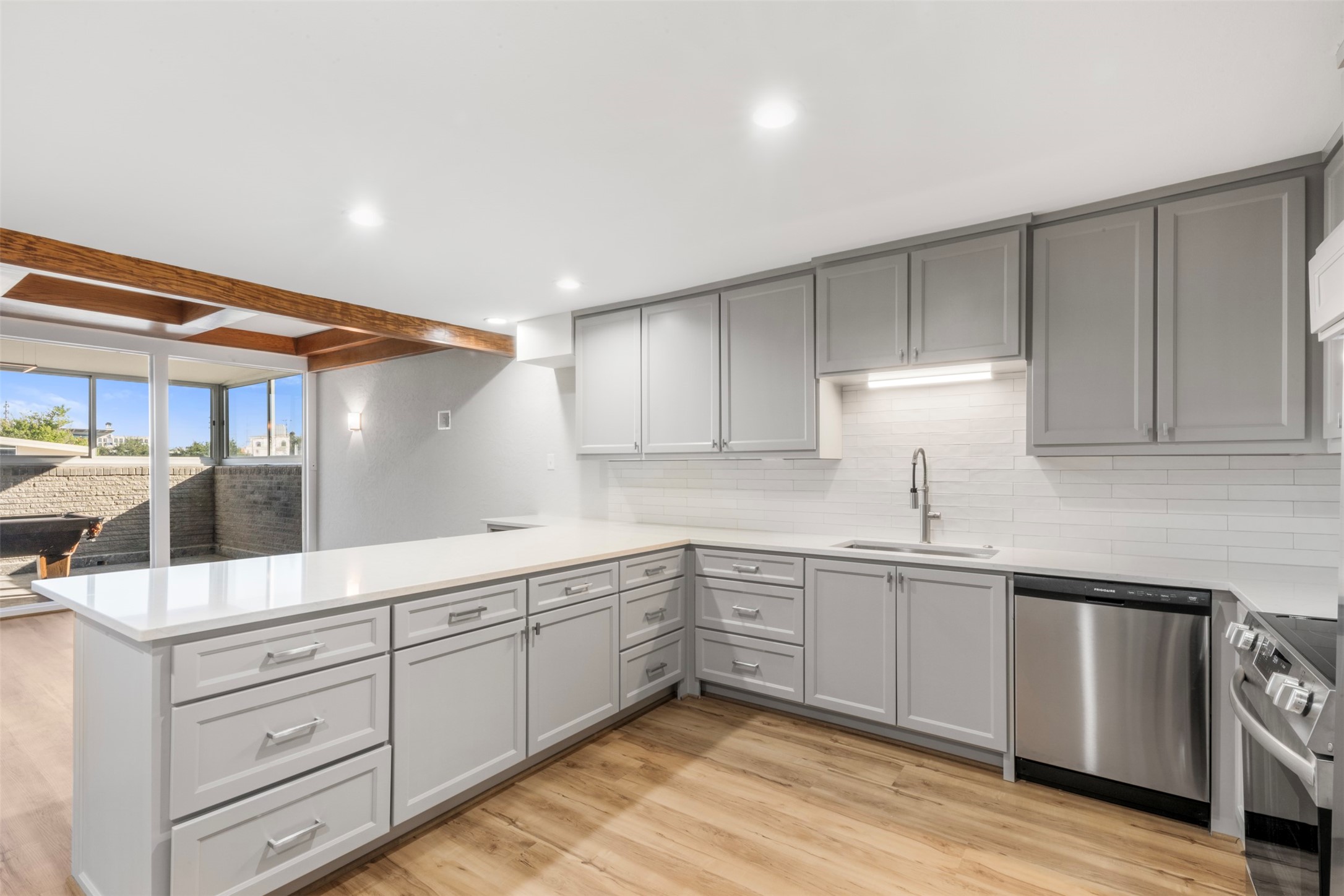 3141 Bissonnet Street Houston, TX 77005 - Photo 25 of 45 a kitchen with sink cabinets and window