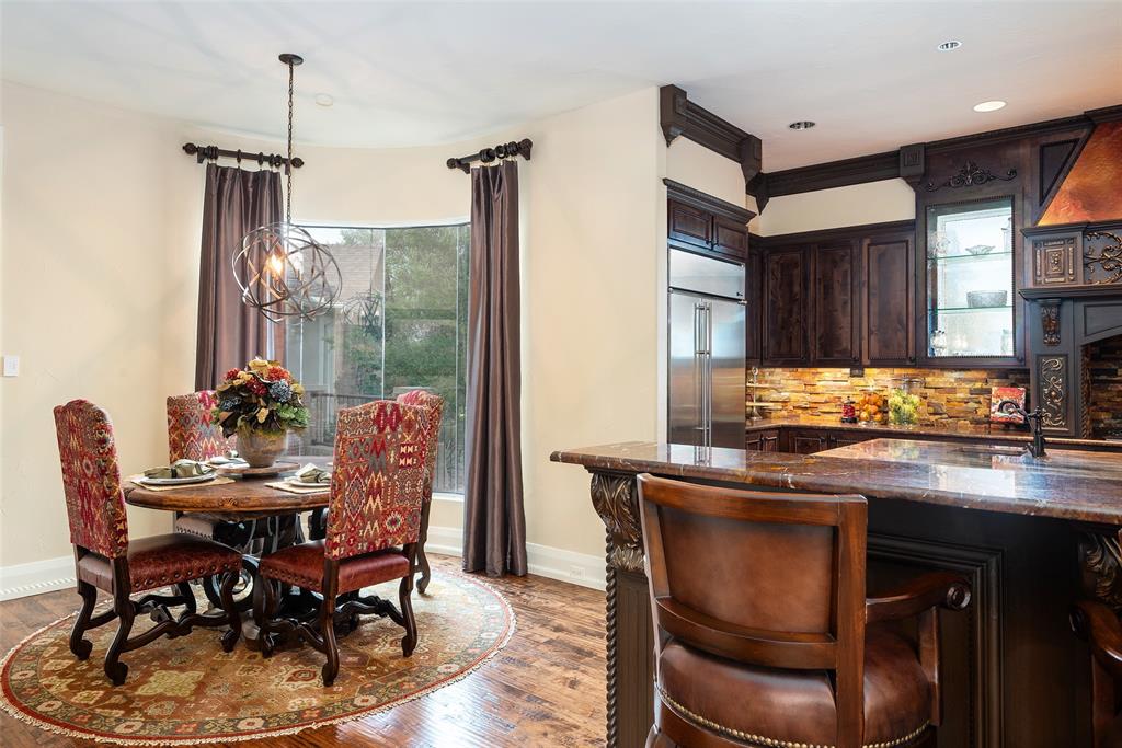 2312 Cactus Rio Lane Weatherford, TX 76087 - Photo 10 of 37 a dining room with furniture window and wooden floor