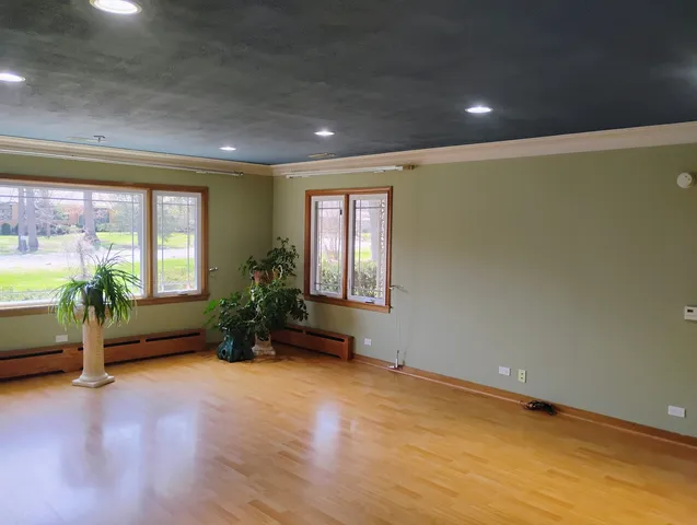 wooden floor and windows in an empty room