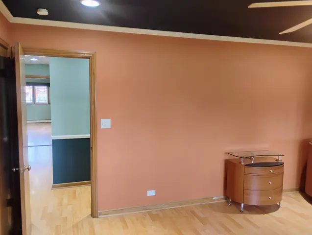 a room with a bed and a window