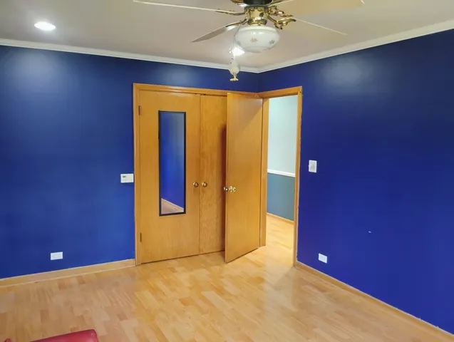 a bed room with a bed and a window