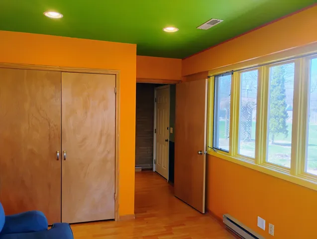 a view of a park with plants and trees