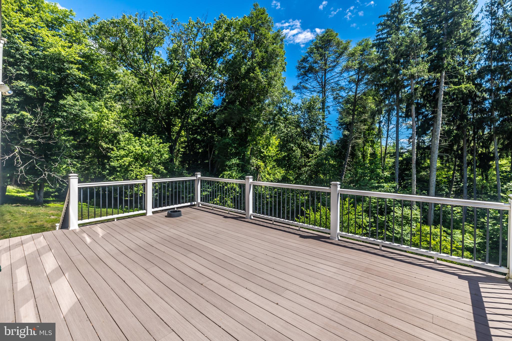 146 Logtown Road Media, PA 19063 - Photo 125 of 128 Serene deck overlooking lush greenery.