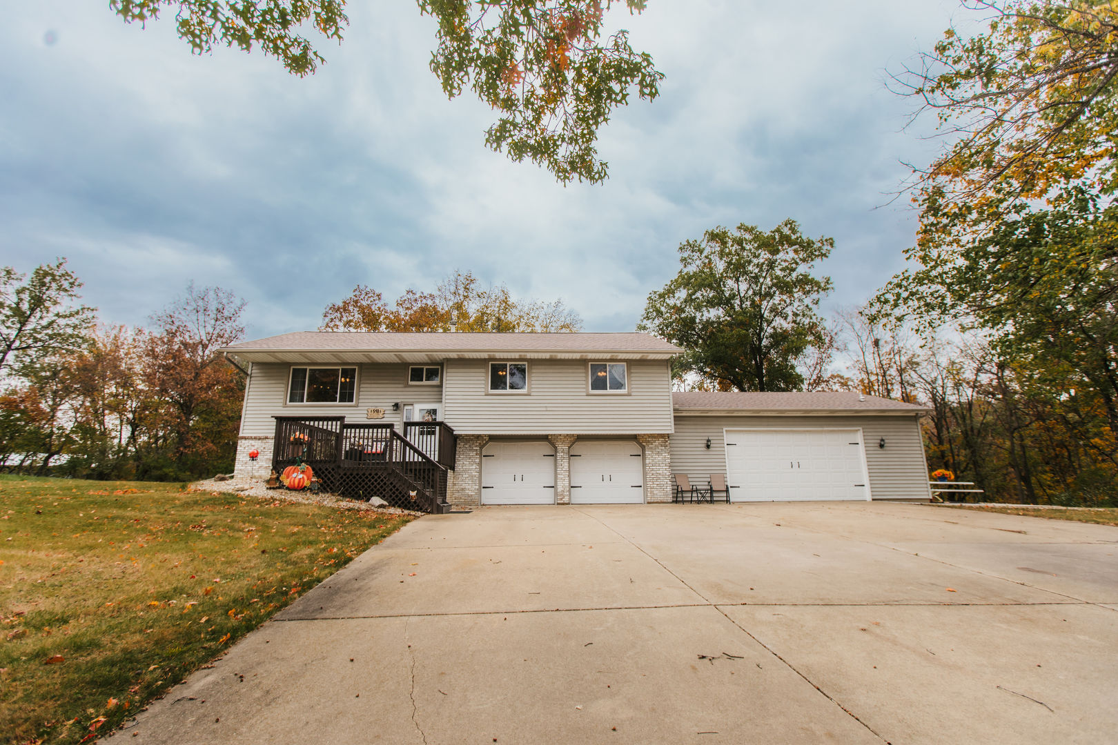518 Brandywine Circle Varna, IL 61375 - Photo 1 of 44 a view of a white house with a big yard and large trees