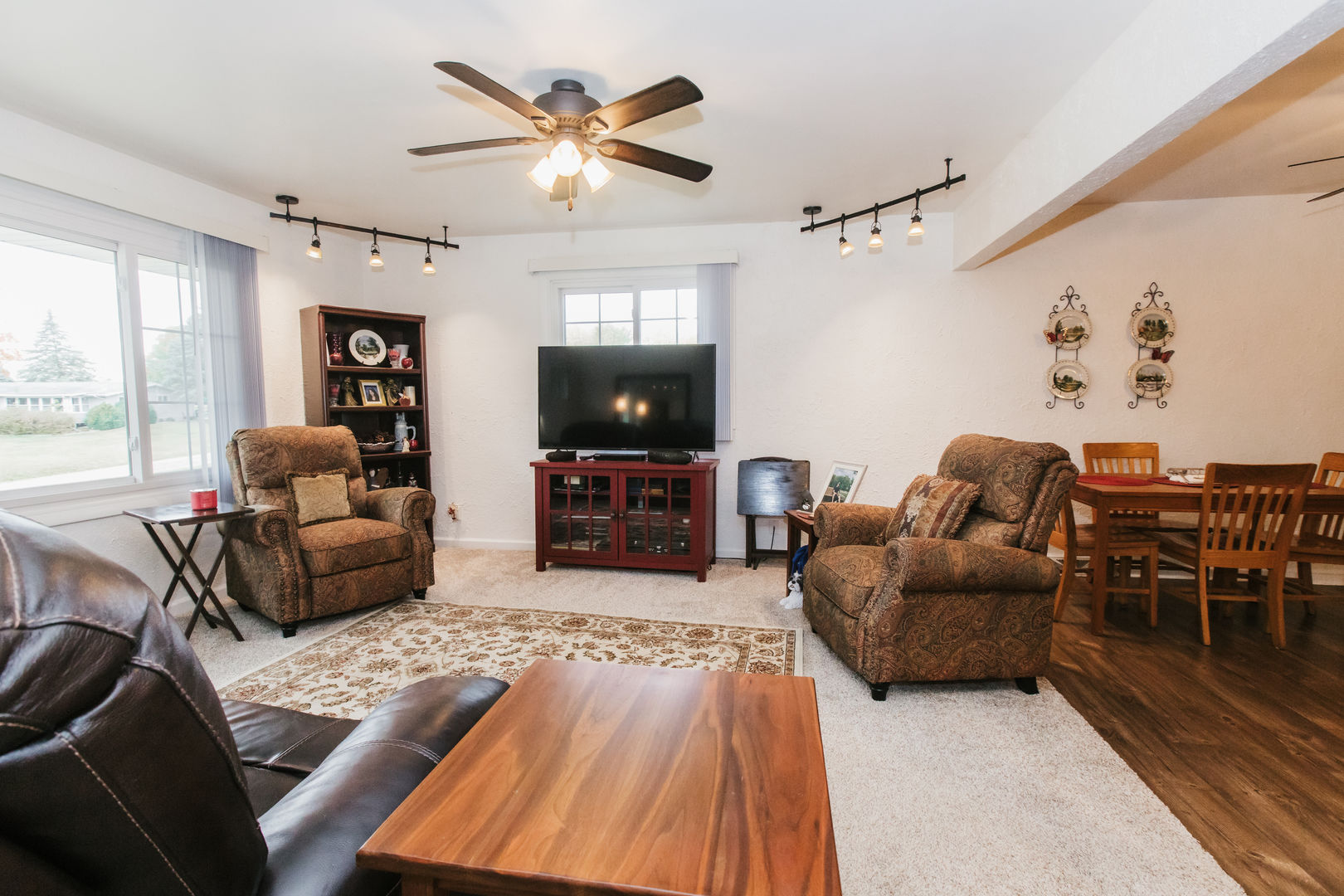 518 Brandywine Circle Varna, IL 61375 - Photo 7 of 44 a living room with furniture and a flat screen tv