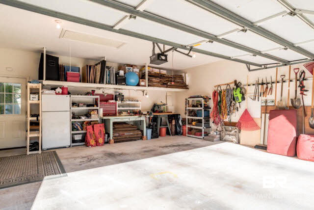 509 Trace Crossing Daphne, AL 36526 - Photo 41 of 41 22'X27' Garage with storage nook and and shelf
