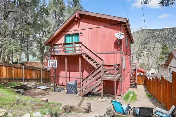 front view of a house with a large window