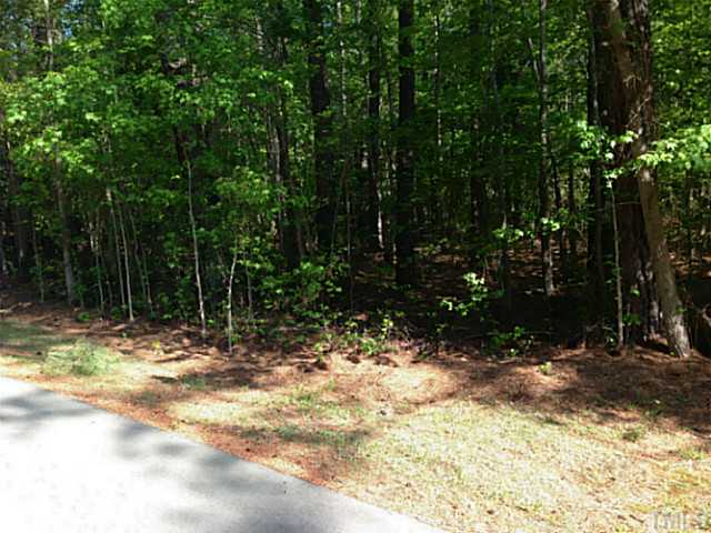 232 Bayleaf Drive, Unit 1 Raleigh, NC 27615 - Photo 5 of 5 a view of a yard with a tree