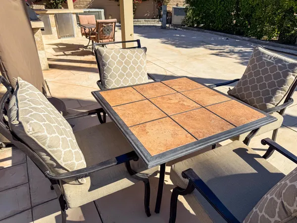 a view of a kitchen with a stove and a large window