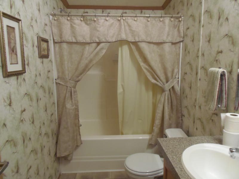 1612 Windsor Road Cheshire, MA 01225 - Photo 22 of 30 a bathroom with a toilet and a shower