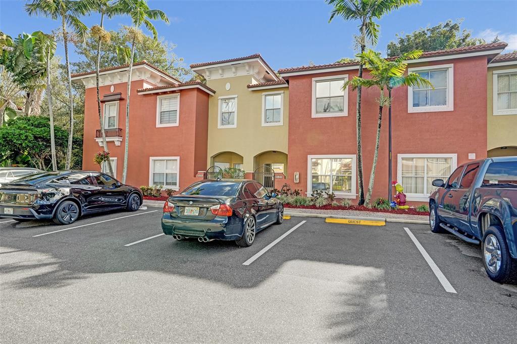 3533 Merrick Lane Margate, FL 33063 - Photo 1 of 27 a car parked in front of a brick house