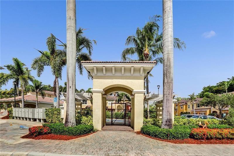 3533 Merrick Lane Margate, FL 33063 - Photo 14 of 14 a front view of a house with a garden