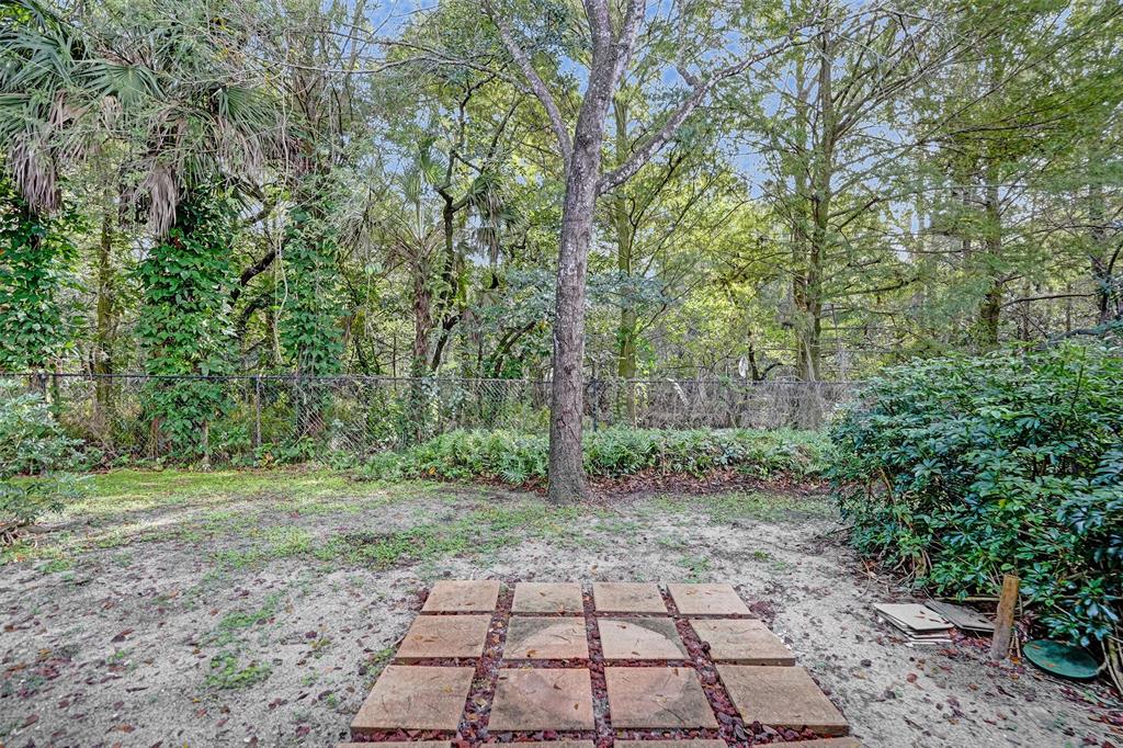 3533 Merrick Lane Margate, FL 33063 - Photo 21 of 27 a view of a yard with trees