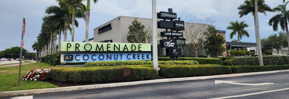 3533 Merrick Lane Margate, FL 33063 - Photo 26 of 27 a street sign on the side of a building