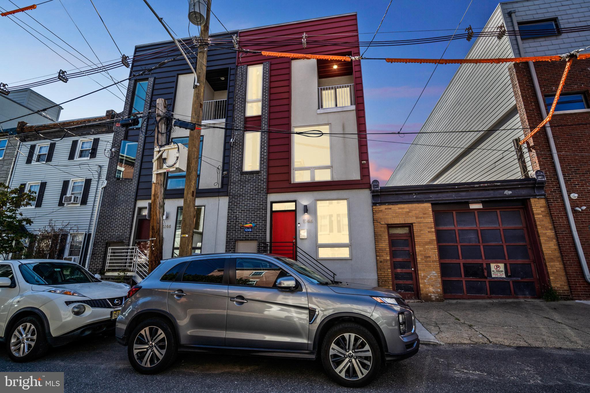 a view of a car parked in front of a building