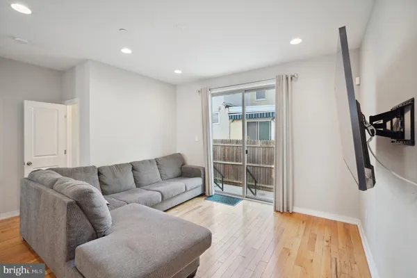 a living room with furniture and a couch