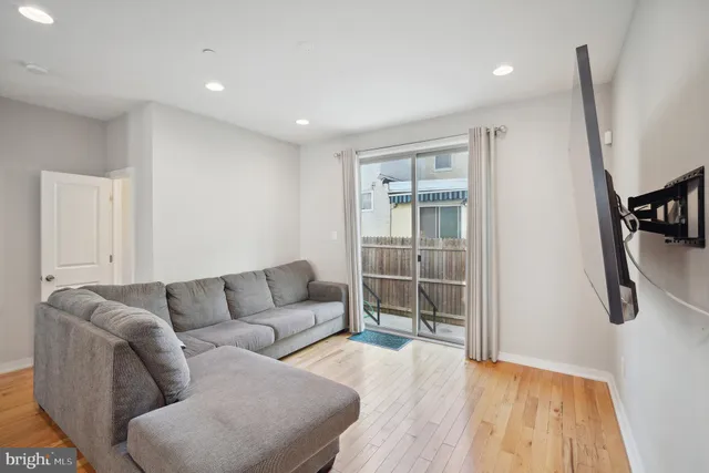 a living room with furniture and a couch