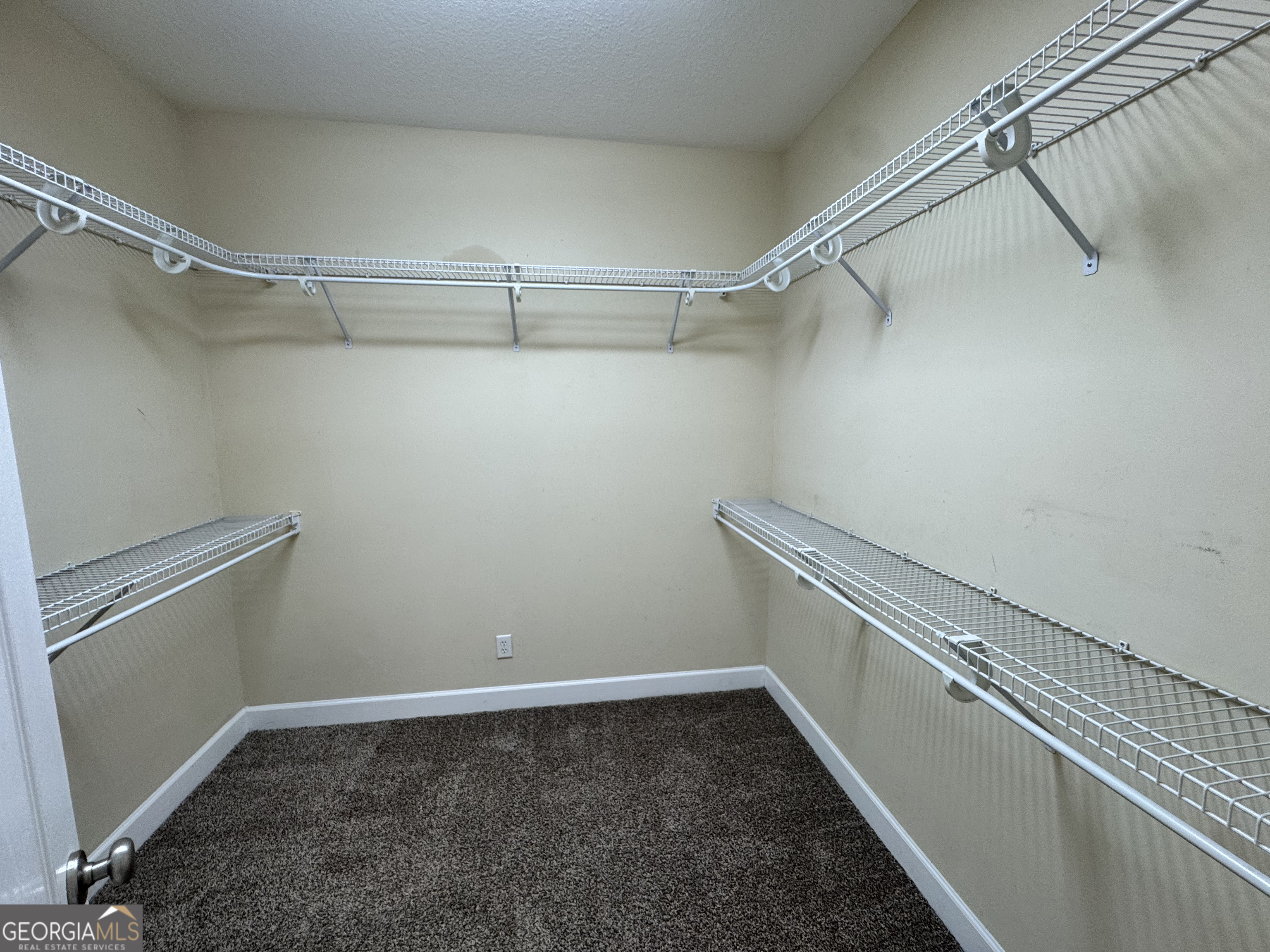 217 Austin Ryan Drive Kingsland, GA 31548 - Photo 16 of 26 a view of a room with racks on the wall
