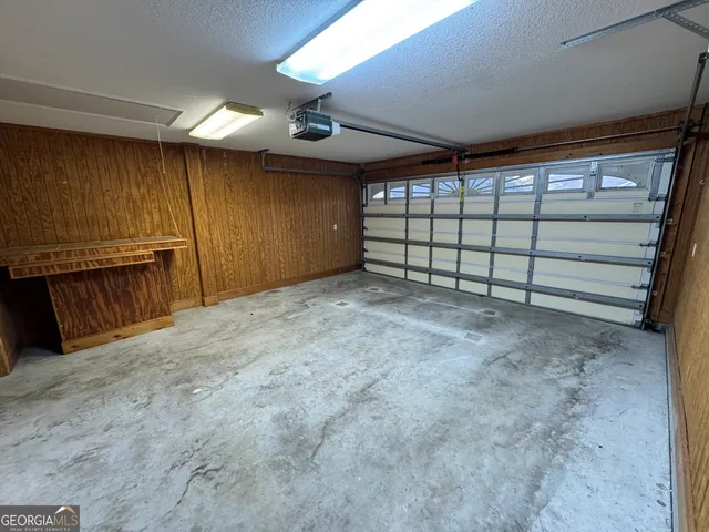 a view of a room with a large window