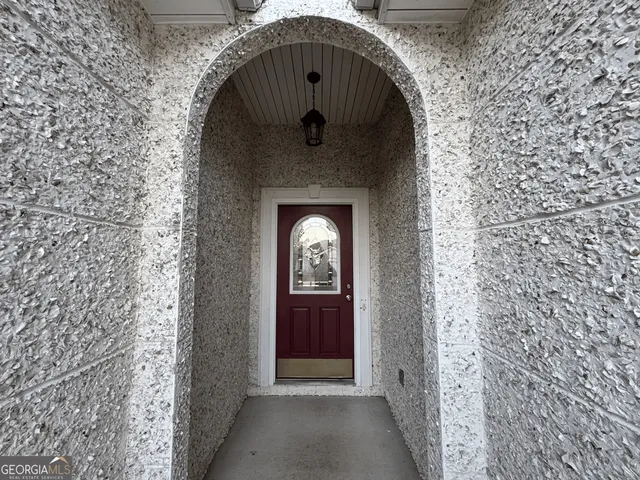 a front view of a house with a door