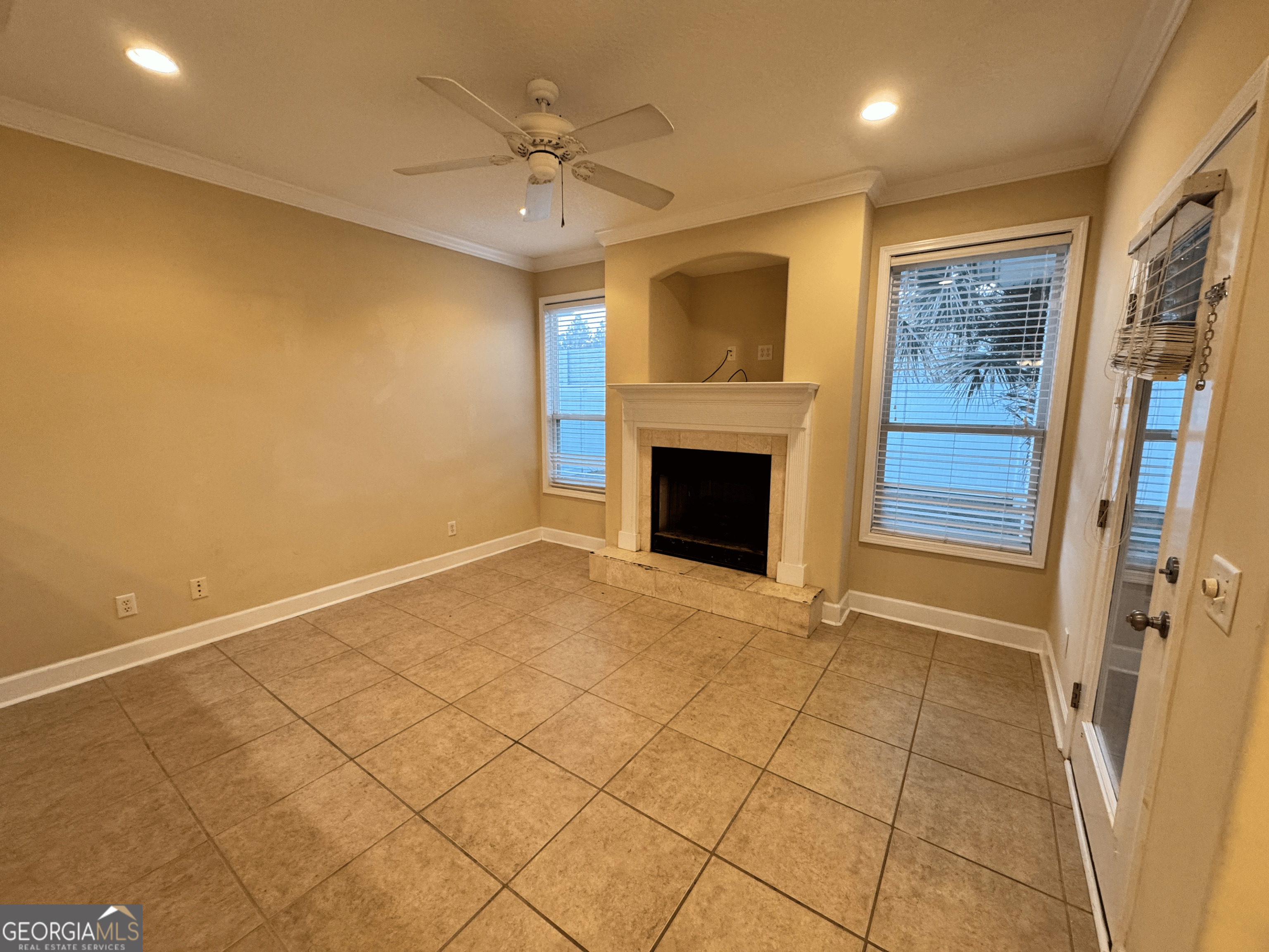 217 Austin Ryan Drive Kingsland, GA 31548 - Photo 9 of 26 a view of an empty room with a fireplace