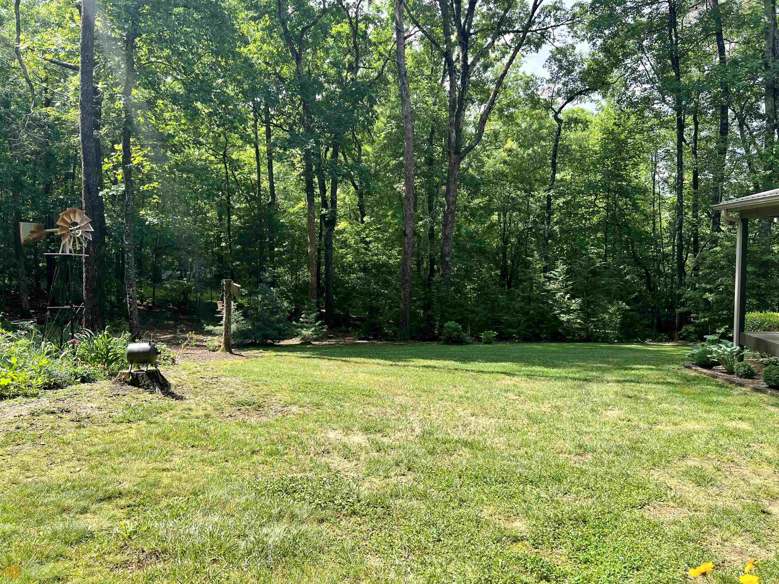 186 Holly Lane Cleveland, GA 30528 - Photo 27 of 58 a view of a backyard with a trees