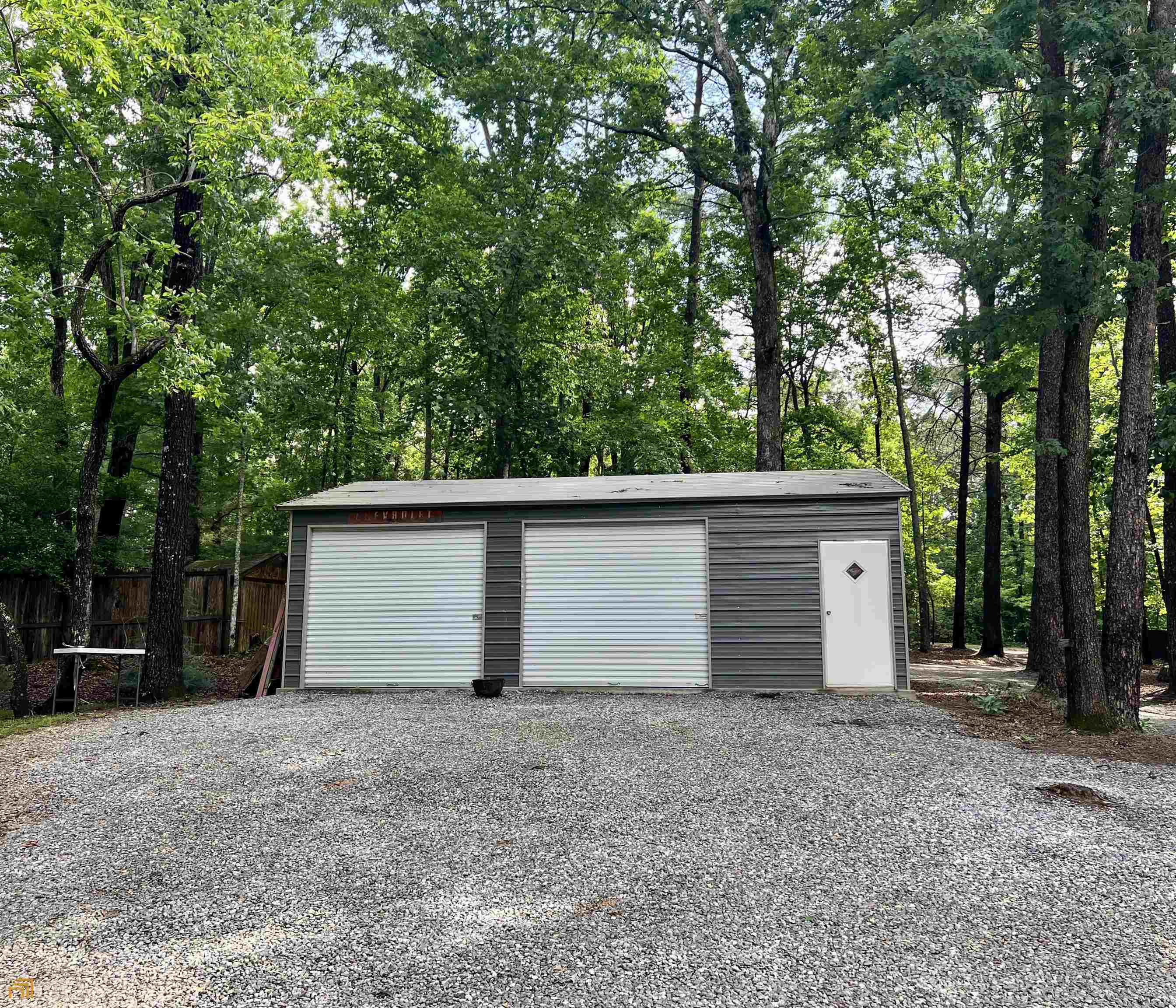 186 Holly Lane Cleveland, GA 30528 - Photo 28 of 58 a view of garage and yard