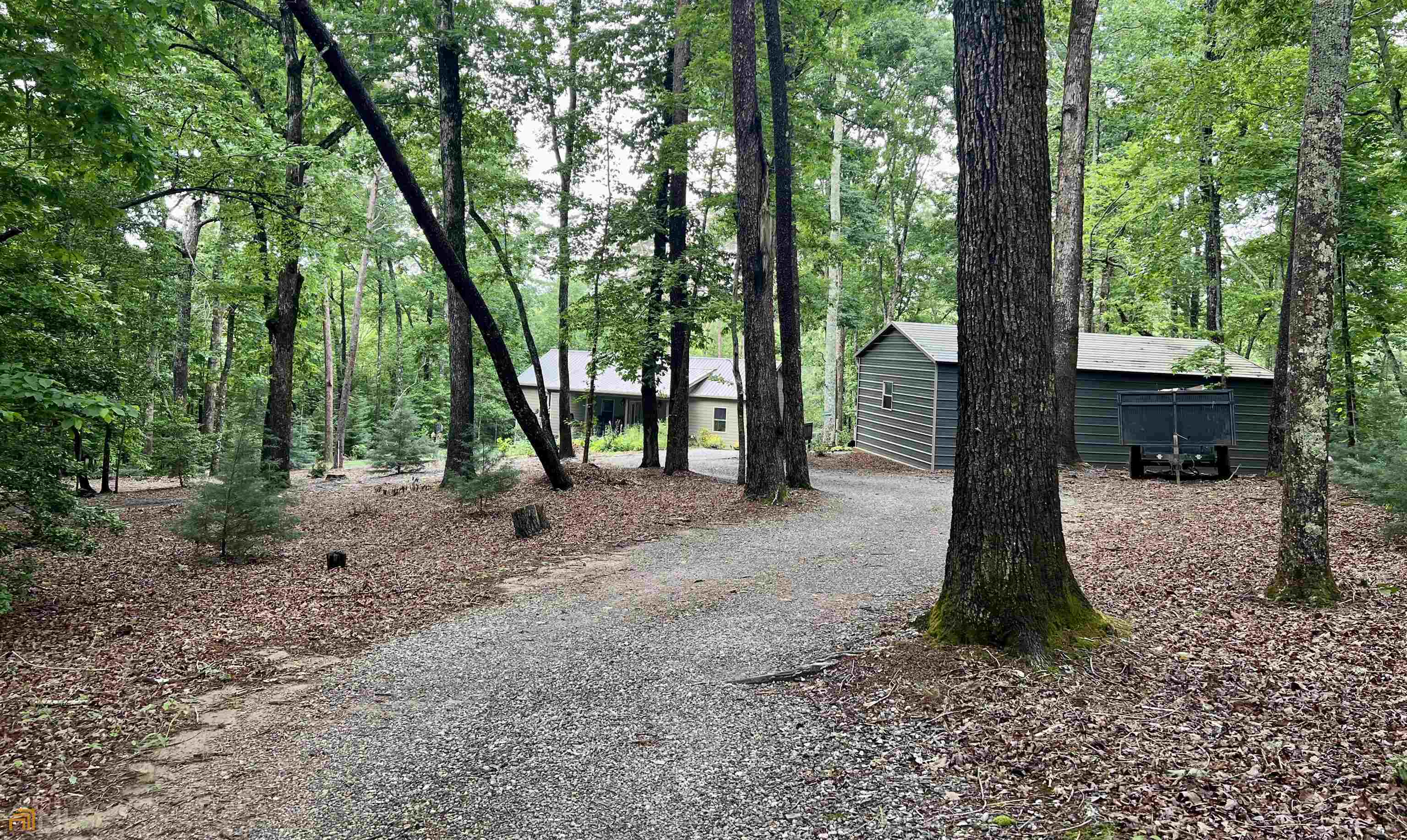 186 Holly Lane Cleveland, GA 30528 - Photo 50 of 58 a backyard of a house with lots of green space