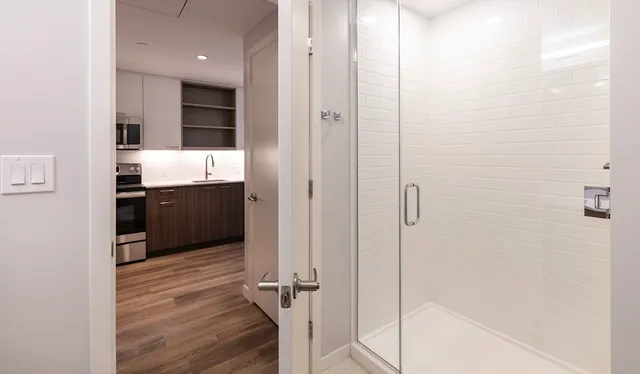 a bathroom with a sink and mirror