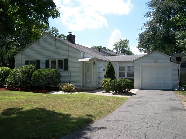 398 Plumtree Road Springfield, MA 01118 - Photo 24 of 24 a front view of a house with yard and green space