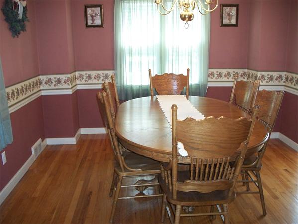 398 Plumtree Road Springfield, MA 01118 - Photo 7 of 24 a view of a dining room with furniture window and outside view