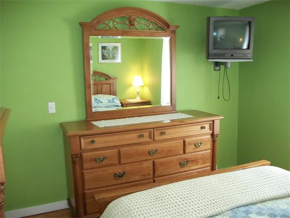 398 Plumtree Road Springfield, MA 01118 - Photo 10 of 24 a bedroom with a bed and a dresser