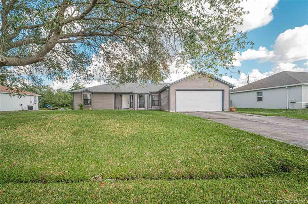 129 Southwest Ridgecrest Drive Port St. Lucie, FL 34953 - Photo 1 of 18