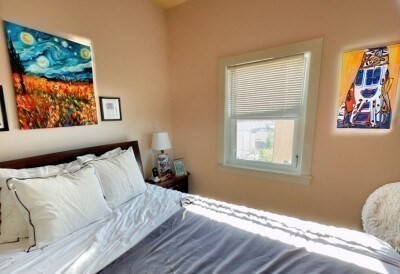207 Princeton Street, Unit 2 Boston, MA 02128 - Photo 7 of 12 a bedroom with bed and a window