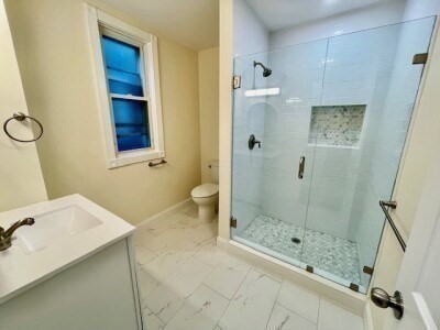 207 Princeton Street, Unit 2 Boston, MA 02128 - Photo 8 of 12 a bathroom with a sink and a shower