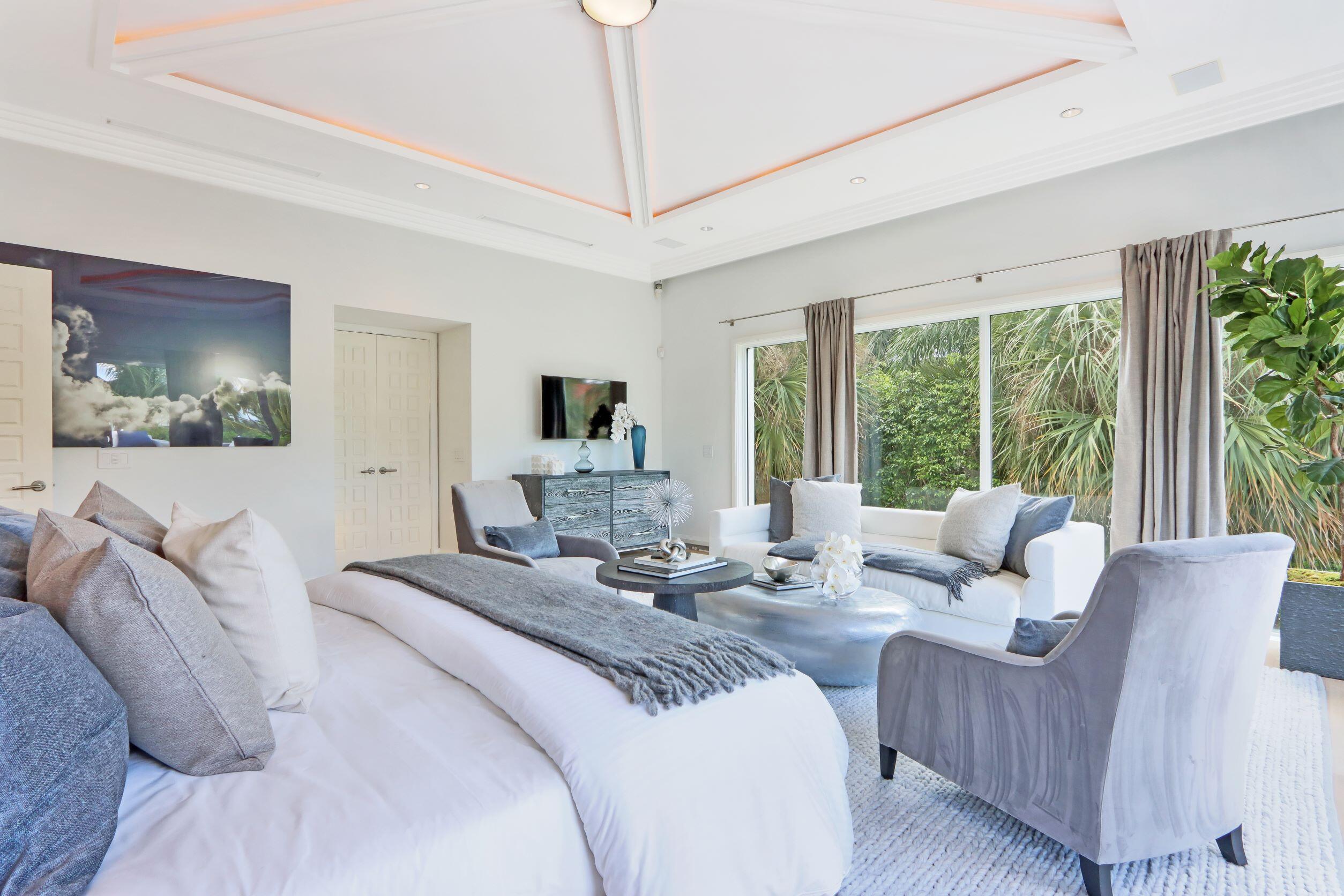 215 Indian Road Palm Beach, FL 33480 - Photo 11 of 33 a living room with furniture and a large window