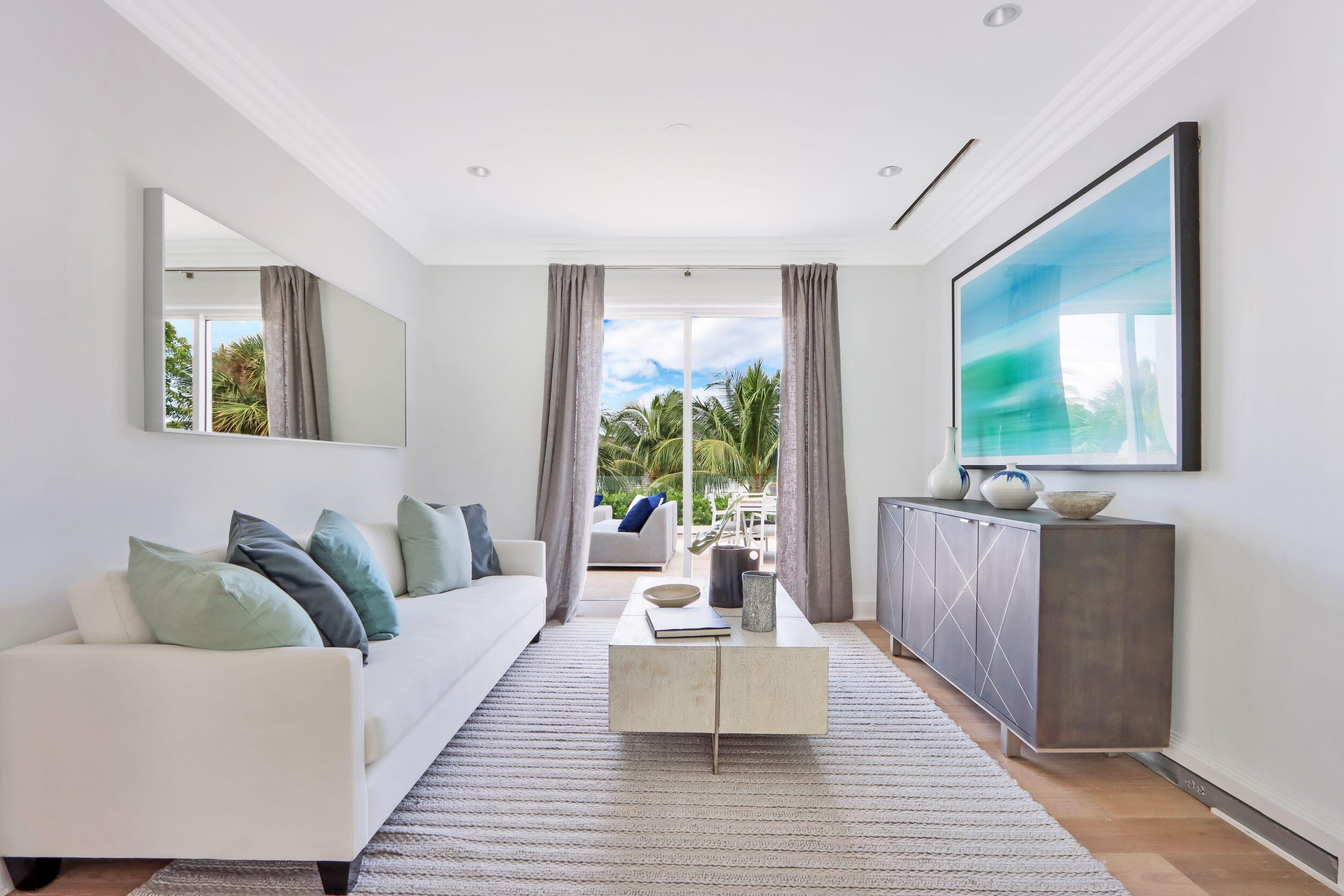 215 Indian Road Palm Beach, FL 33480 - Photo 12 of 33 a living room with furniture and a large window