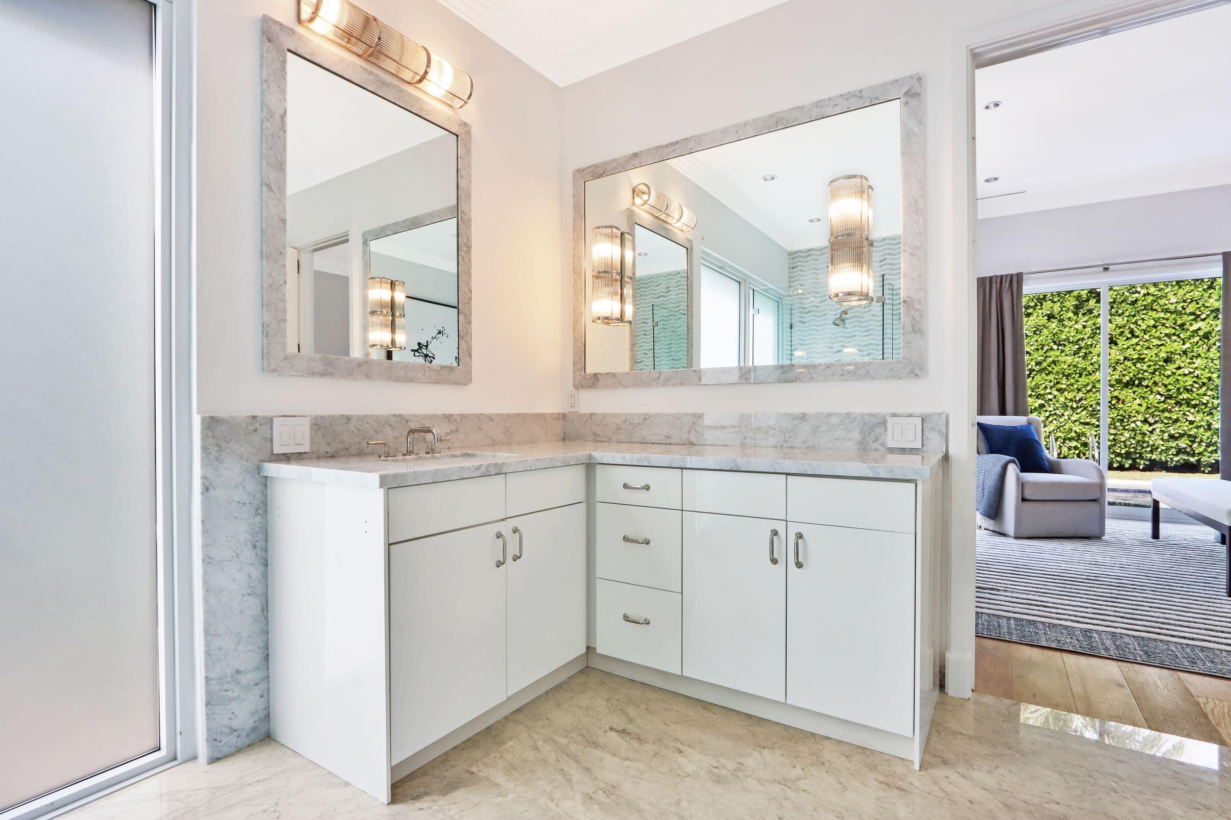215 Indian Road Palm Beach, FL 33480 - Photo 21 of 33 a bathroom with a granite countertop sink mirror and window