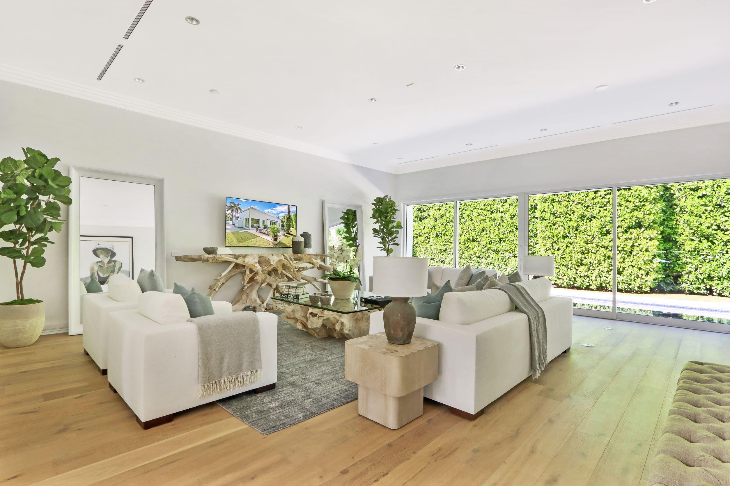 215 Indian Road Palm Beach, FL 33480 - Photo 3 of 33 a living room with furniture and a large window