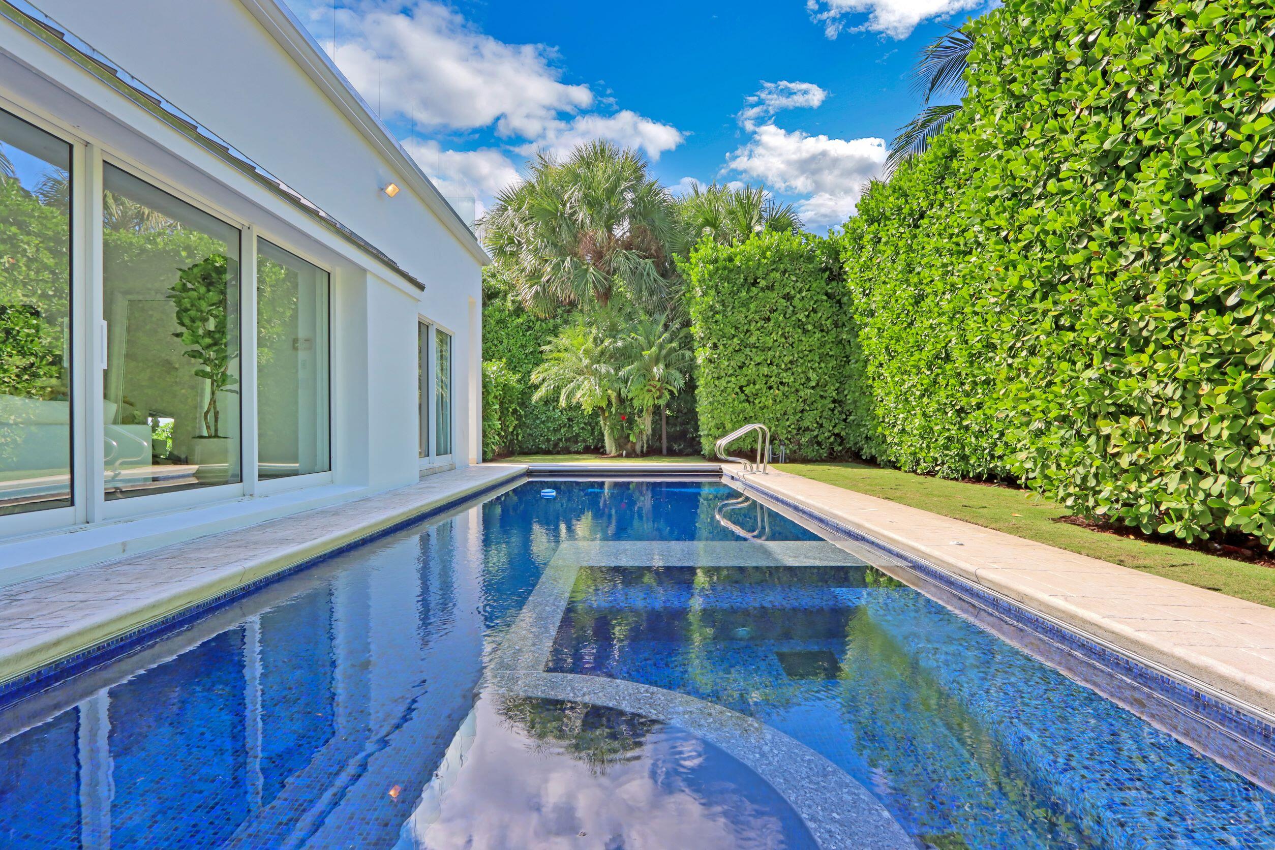 215 Indian Road Palm Beach, FL 33480 - Photo 32 of 33 a view of balcony with wooden floor and fence